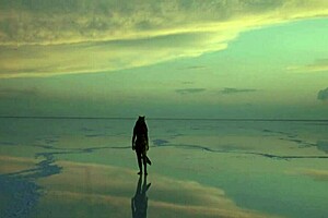 Pink sky and white salt under a stunning view.