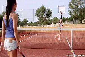Seductive milf enjoys sunset fingering at tennis court.