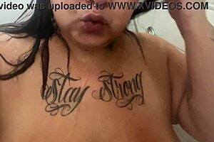 Mary Jhuana tests the shower while bathing