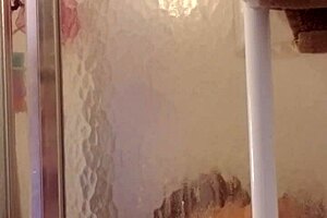 Shy milf bathes and shaves her smooth body