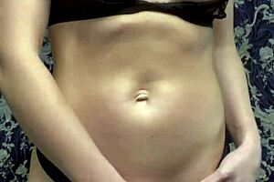 busty babe in lingerie plays with wet pussy, masturbating to orgasm in stockings