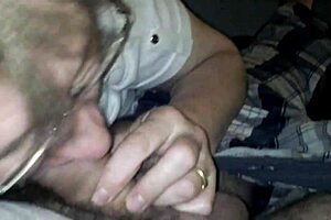 Amateur mature blonde sucks cock in garage.