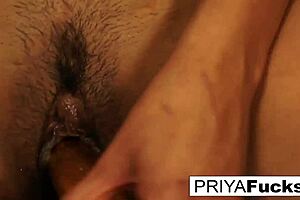 Watch Priya Rai play with her golden vibrator in the dining room?