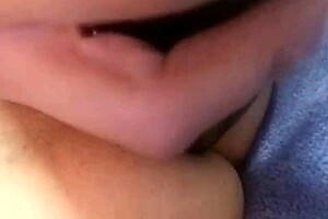 madura centroamericana enjoying a relaxing moment with a cucumber.