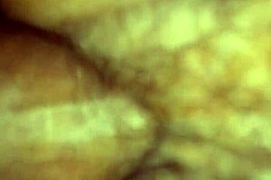 A close up of a wet mature pussy being pleasured.