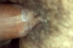 A close up of a wet mature pussy being pleasured.