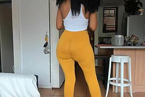 Ebony Booty Squeezes In Tight Leggings