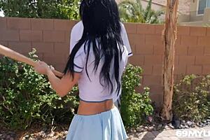 Milf Crystal Rush grips the long bat tightly in her hands