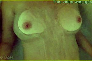 wife soaks in hotel bath, big tits glistening wet