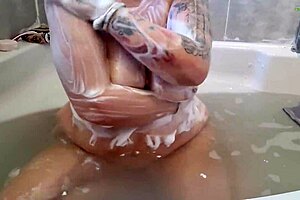 Milf soaping tits and ass in bath