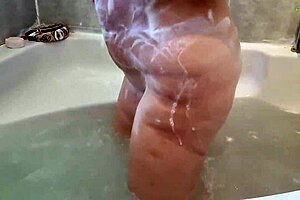 Milf soaping tits and ass in bath