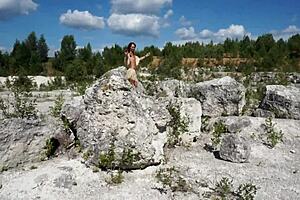 i'm dancing topless in this white stone quarry with nature around