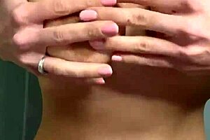 Hot Student Caresses Big Tits?