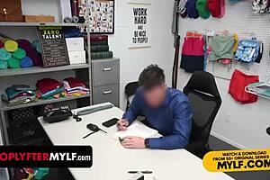 Former employee Vanessa Cage negotiates her freedom with the officer at the shop