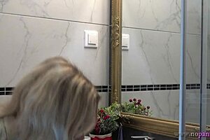 Sexy Blonde Wife Switches Panties in Bathroom Voyeur Clip