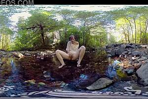 Redhead milf Carmen December masturbates outdoors to climax with toys