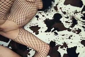 milf wife in fishnet outfit experiences stretching in the scene