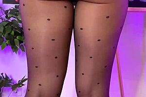 Sexy mature blonde dons see-through tights at club