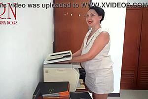 dumb secretary caught on office cam scanning boobs at scanner