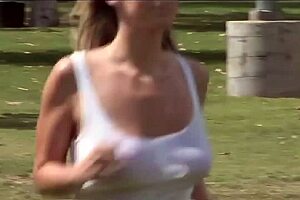 Carolyn Reese, the beautiful blonde milf, masturbates on the bed in fishnets, showing her big tits and shaved pussy before taking a monster cock.