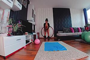 Naked yoga workout with hula hoop focusing on ass