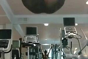 beautiful 21-year-old with brown eyes works out in dorm