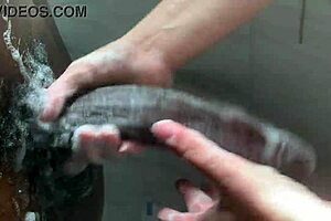 Horny College Babe Worships Massive Black Cock in Bathing Scene