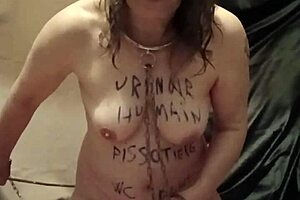 Slave in human urinal setup with buttplug