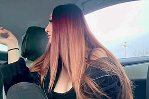 italian milf artemisia love smokes a cigarette in the car, flashing her big tits and nipple.