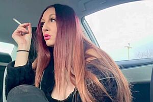 italian milf artemisia love smokes a cigarette in the car, flashing her big tits and nipple.