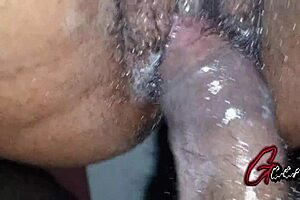 A close-up view of mature sex with hairy pussy and big cock.