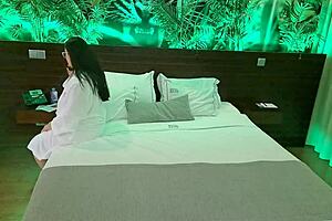 Latina milf seduces chubby hotel handyman. He oils her up until she squirts everywhere!