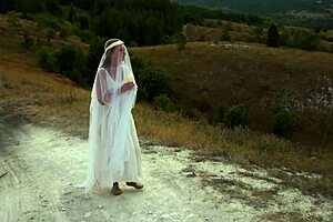 Amateurs hiking to the top of the hill.