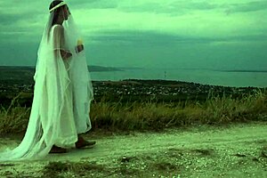 Amateurs hiking to the top of the hill.