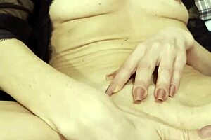 Blonde milf in lingerie reaches orgasm through solo play