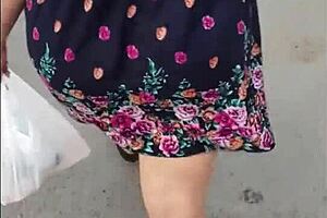 Following Curvy Latina Milf Flashing Skirt And Thong