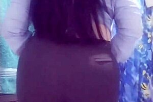 She strips in the laundry room showing her big ass and tits