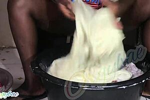 Housewife Does Weekend Laundry in Shaved Pussy