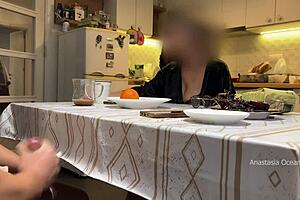 my husband jerks under the table in front of my stepmom and me in the kitchen?