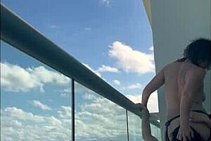 Mexican milf enjoys strap on love in Cancun