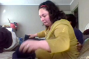 Wife patiently teaches folding clothes at home