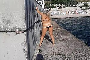 wet big boobs get sucked on toy in public outdoor setting with amateurs