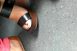 Mature Feet In Candid Wedges And Sandals.