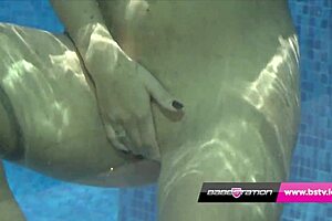 Leah strips by pool, flaunting big tits and shaved pussy outdoors