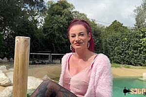 Hey, wanna watch fiery redhead Sally play with two massive cocks?  