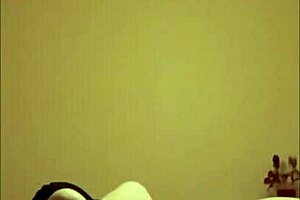 Maitresse K in body and stockings dominates her slave with intense orgasms