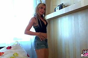 Milf teases with striptease in tight jeans