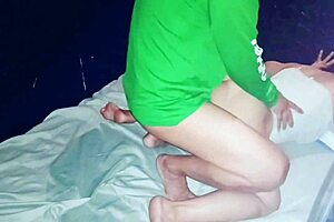 asian chubby pregnant mom relaxes at home with family