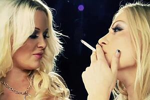 Hot lesbian babes indulge in smoking fetish and passionate kissing! 😘