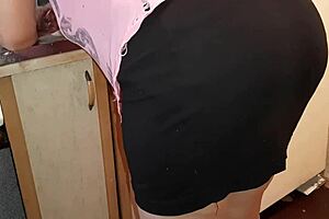 I secretly masturbate next to my stepmom in the kitchen miniskirt, risking orgasm and cum.